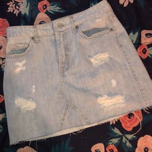 distressed light blue jean skirt